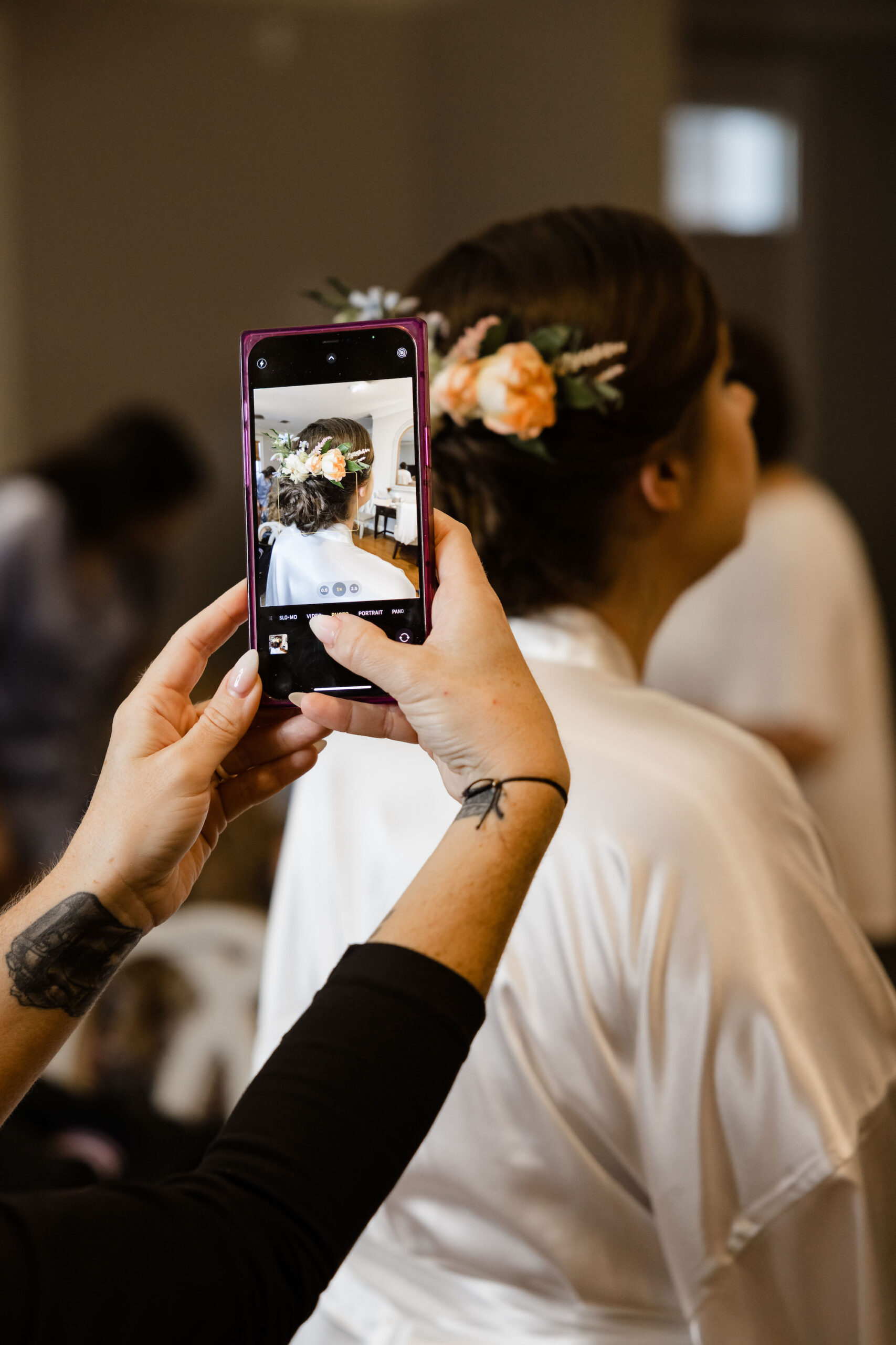 Bridal Bun Updo with Flower Accessory Wedding Hair Ideas