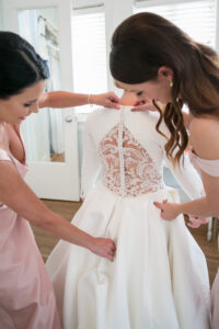Bride and Bridesmaids Getting Ready Wedding Portrait | Button Back Sheer Lace Wedding Dress Ideas