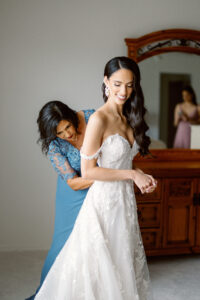 Off-shoulder Ivory Sweetheart Neckline Lace White Magnolia Wedding Dress | Bride Getting Ready Wedding Portrait
