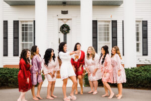 Red, Purple, Blush, and Pink Robe Inspiration | Bride and Bridemaids Getting Ready Wedding Portrait