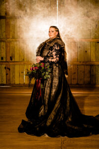 Black Long Sleeve Sheer Lace A-Line Maggie Sottero Wedding Dress Ideas | Fur Stole | Viking Themed Wedding Inspiration