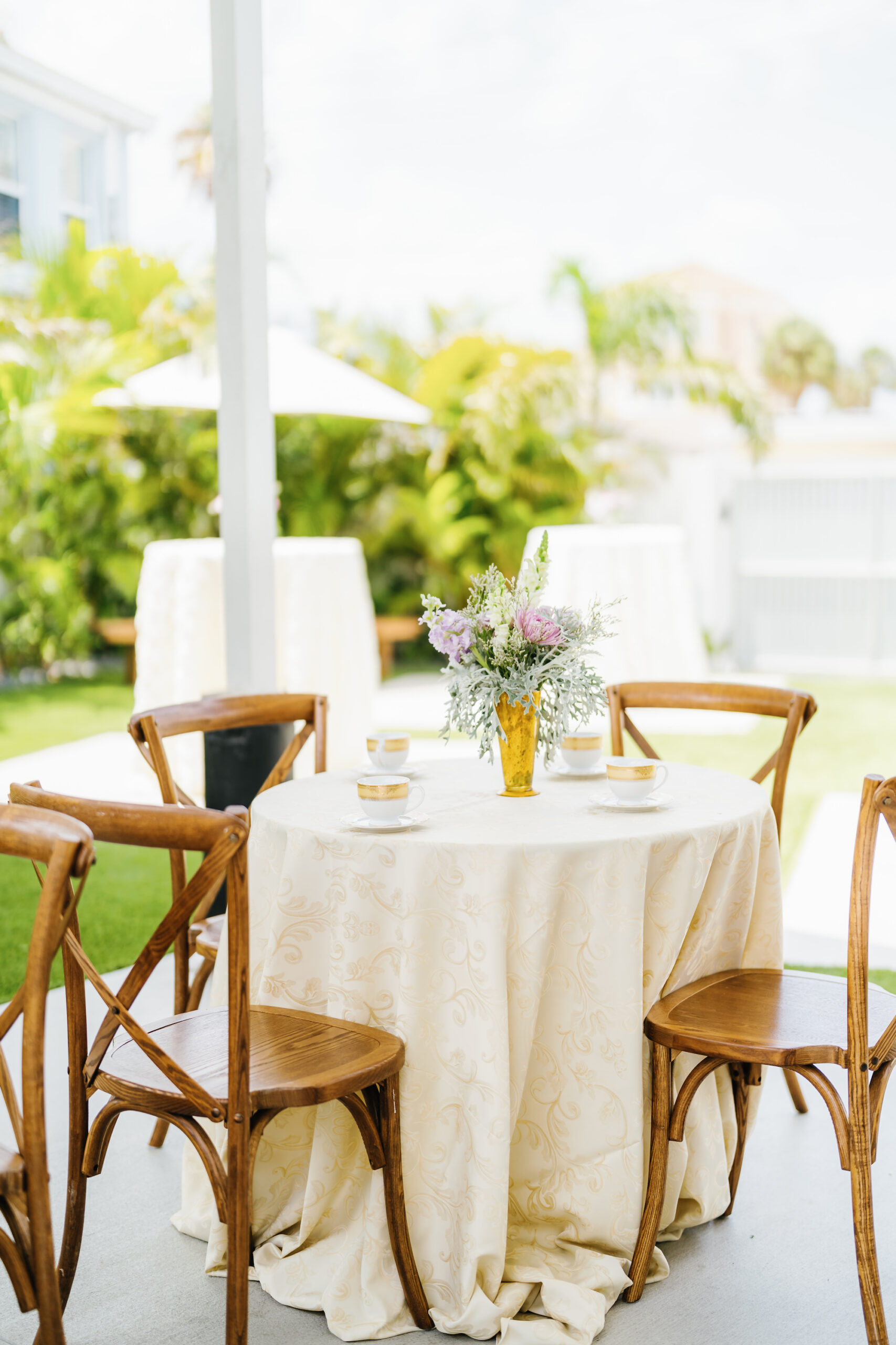 Crossback Wooden Chair Seating Ideas | Purple Spring Wedding Reception Centerpiece Inspiration