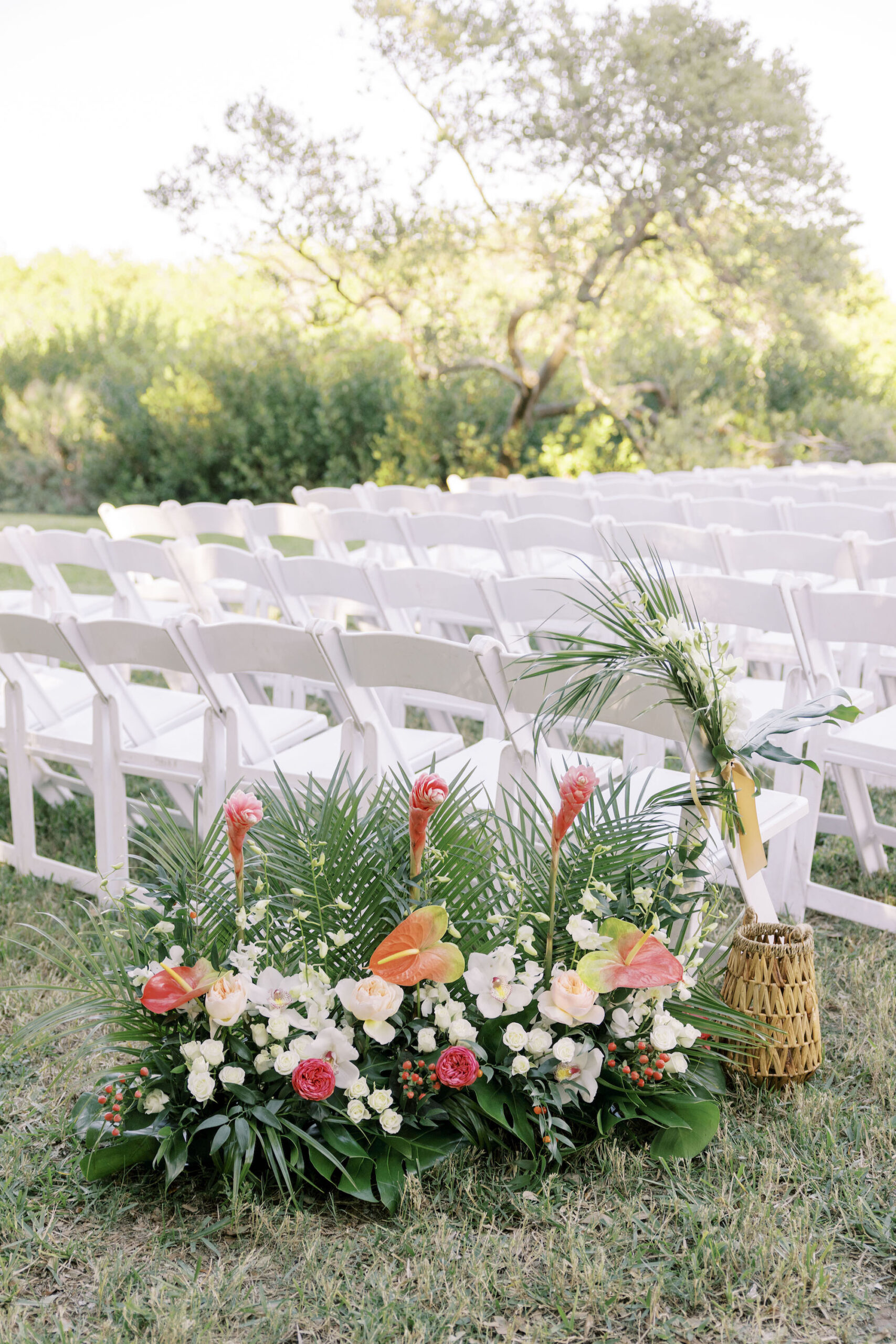 Tropical Palm Leaf, Monstera, Torch Ginger, Pink Garden Rose, Orange Anthurium Ground Wedding Ceremony Flower Arrangement Ideas | Sarasota Florist Beneva Weddings and Events