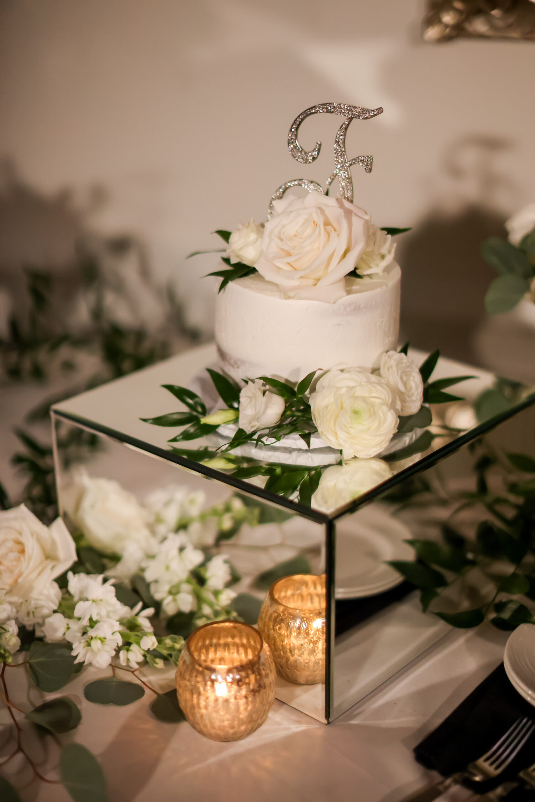One Tier Semi Naked White Round Wedding Cake with Sparkly Initial Topper and White Floral and Greenery Ideas