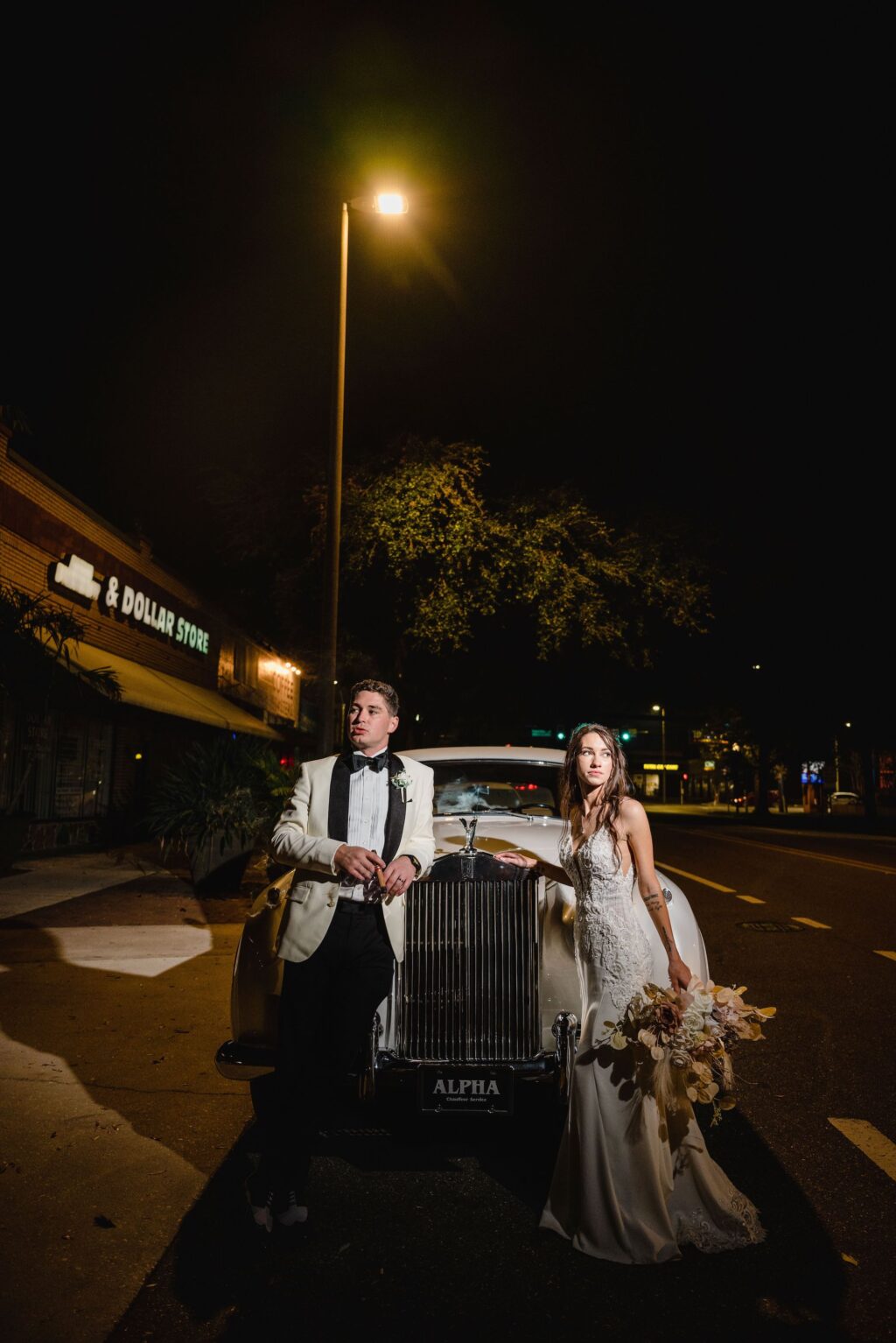Bride and Groom Rolls Roycew Vintage Car Wedding Exit Portrait Great Gatsby Inspired Theme | Tampa Bay Wedding Photographer and Videographer Iyrus Weddings