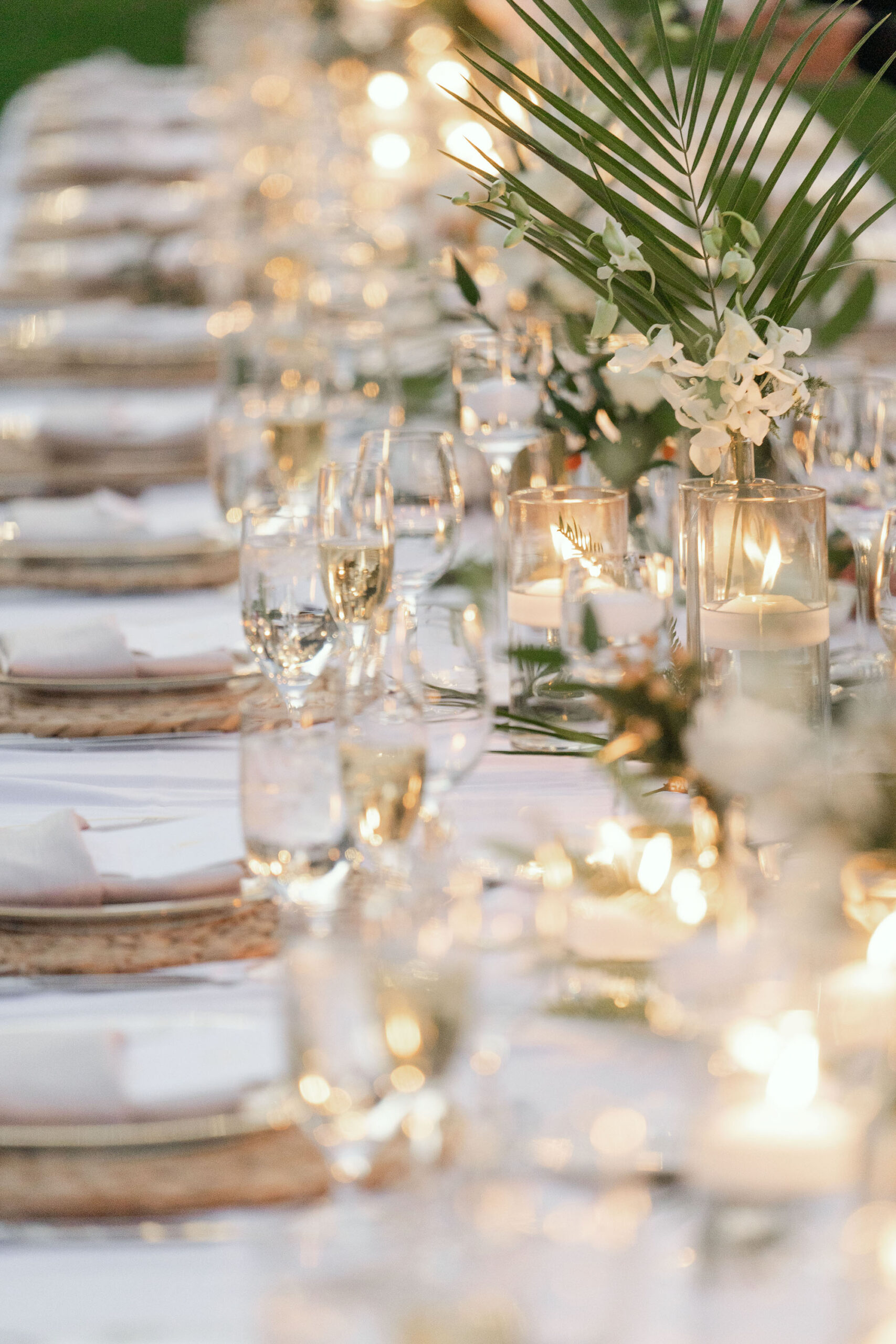 Elegant Tropical White Wedding Reception Feasting Table Decor Inspiration