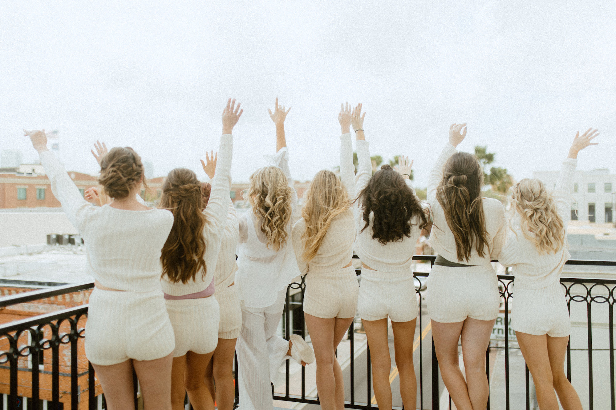 Bridesmaids Getting Ready in Matching White Pjs Inspiration Wedding Portrait