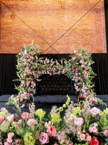 Wedding Reception Sweetheart Table Flower Arrangements with Pink Roses, Hydrangeas, and Greenery Inspiration
