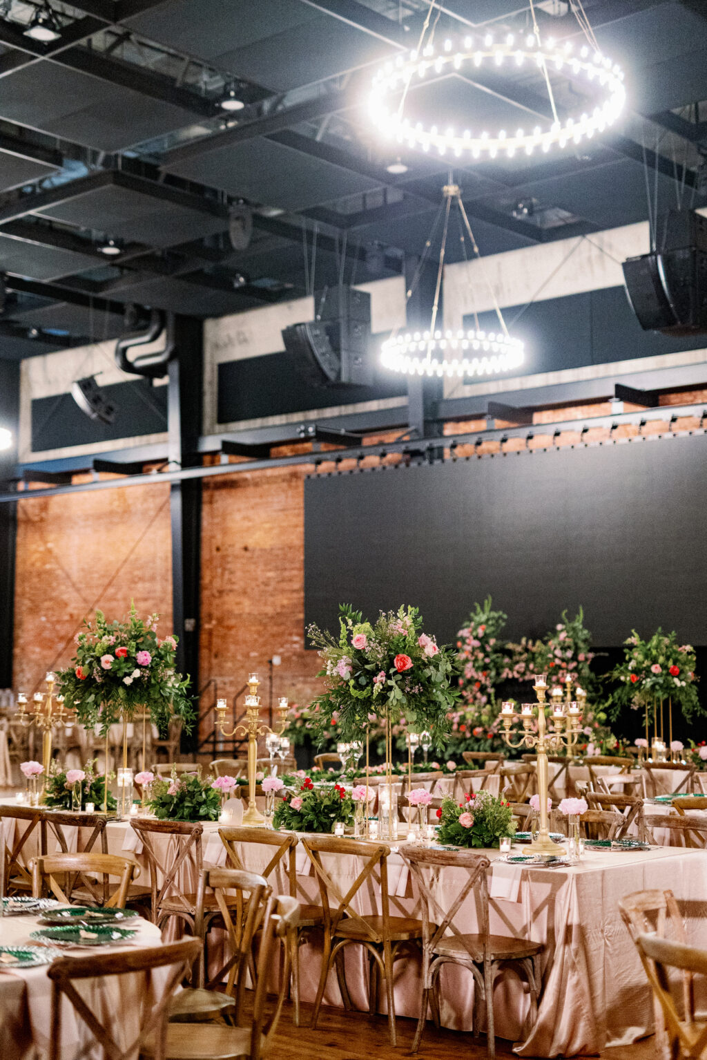 Romantic Wedding Ideas | Long Feasting Tables with Gold Candelabras and Tall Flower Stand Centerpieces with Eucalyptus, Pink and Red Roses | Tampa Bay Rentals A Chair Affair