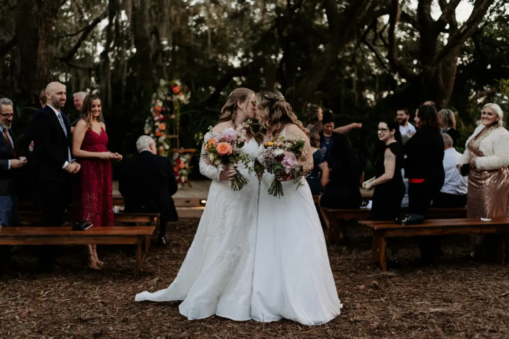 Brides First Kiss After Saying I Do Wedding Portrait | Tampa Wedding Venue Mill Pond Estates | Planner Stephany Perry Events