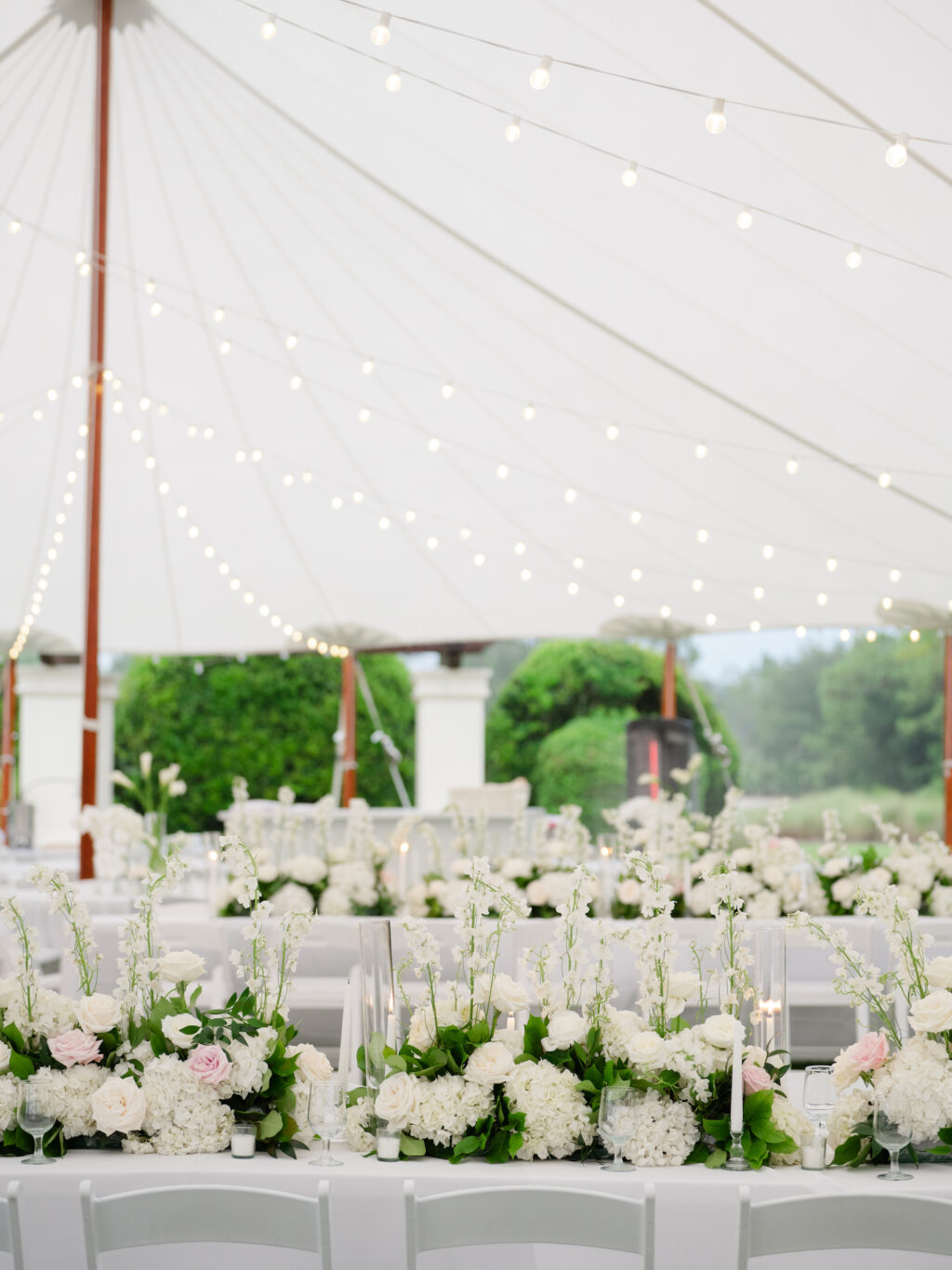 Timeless White Stock, Garden Roses, and Hydrangeas Feasting Table Centerpieces | Sailcloth Tent | Timeless Wedding Reception Inspiration | Sarasota Venue The Concession Golf Club