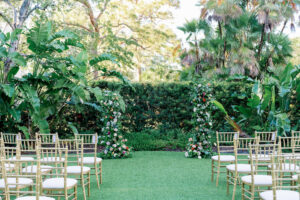 Asymmetrical Roses and Greenery Flower Stand for Altar Inspiration | Gold Chiavari Chairs for Garden Wedding Ceremony Ideas | Tampa Bay Kate Ryan Event Rentals | Venue Tampa Garden Club