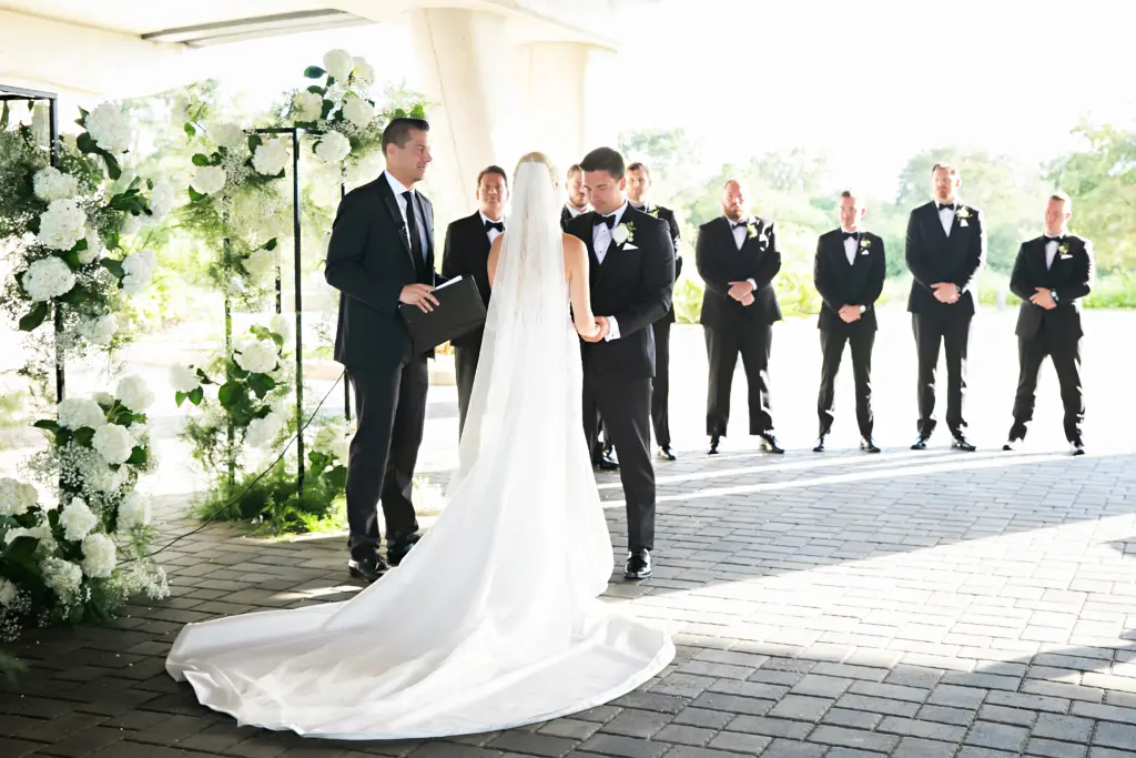 Bride and Groom Wedding Vow Exchange | Elegant White Satin Wedding Dress Inspiration