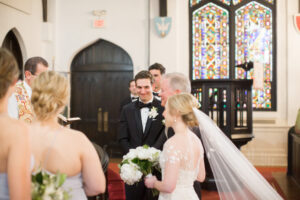 Groom's Reaction to Bride Walking Down Aisle Wedding Portrait
