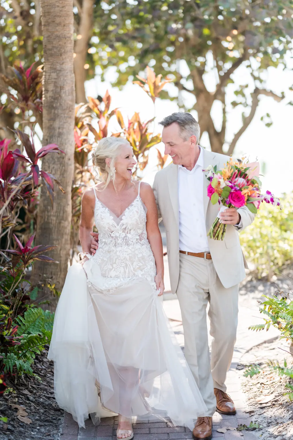 Bride and Groom Wedding Portrait with Bright Floral Bouquet Ideas