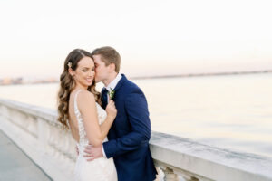 Bride and Groom On Bayshore Boulevard Downtown Tampa Sunset Wedding Portrait | Tampa Bay Planner Kelly Kennedy Weddings and Events