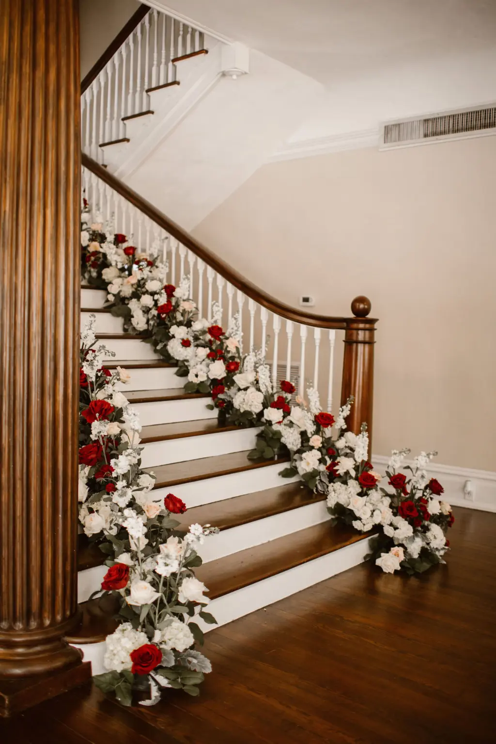 White and Burgundy Rose Flower Arrangements for Stairs at Wedding Reception Inspiration