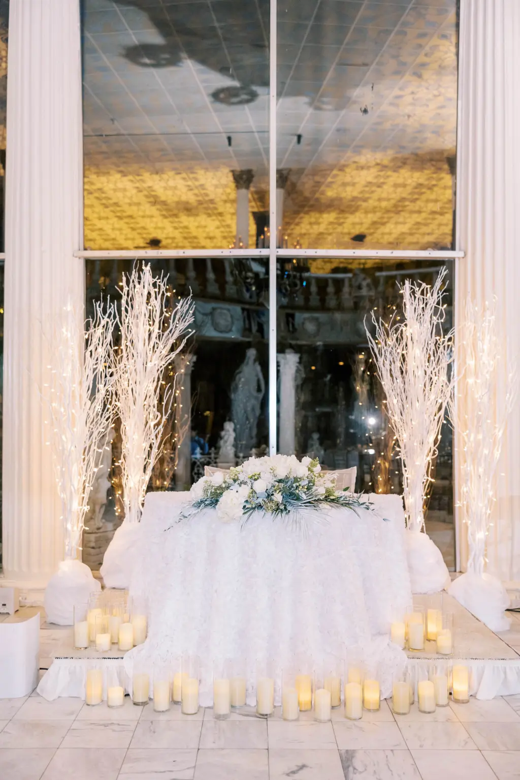 Candlelit Sweetheart Table with White Birchwood Tree Decor for Wedding Reception