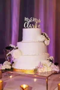 Classic Round Three-Tiered Wedding Cake with White Garden Roses and Custom Mr. & Mrs. Cake Topper