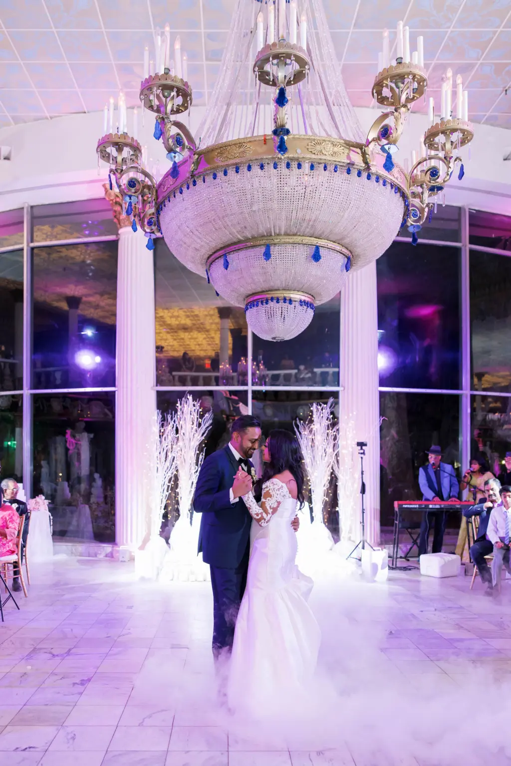 Bride and Groom First Dance with Dancing on a Cloud | Winter Wonderland White Wedding Inspiration | Clearwater Wedding Planner Coastal Coordinating | Venue Kapok Special Events