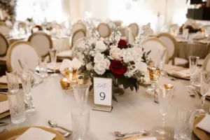 White Stock Flowers, Blush and Burgundy Rose Centerpiece Inspiration for Wedding Reception | Gold Framed Table Number Ideas