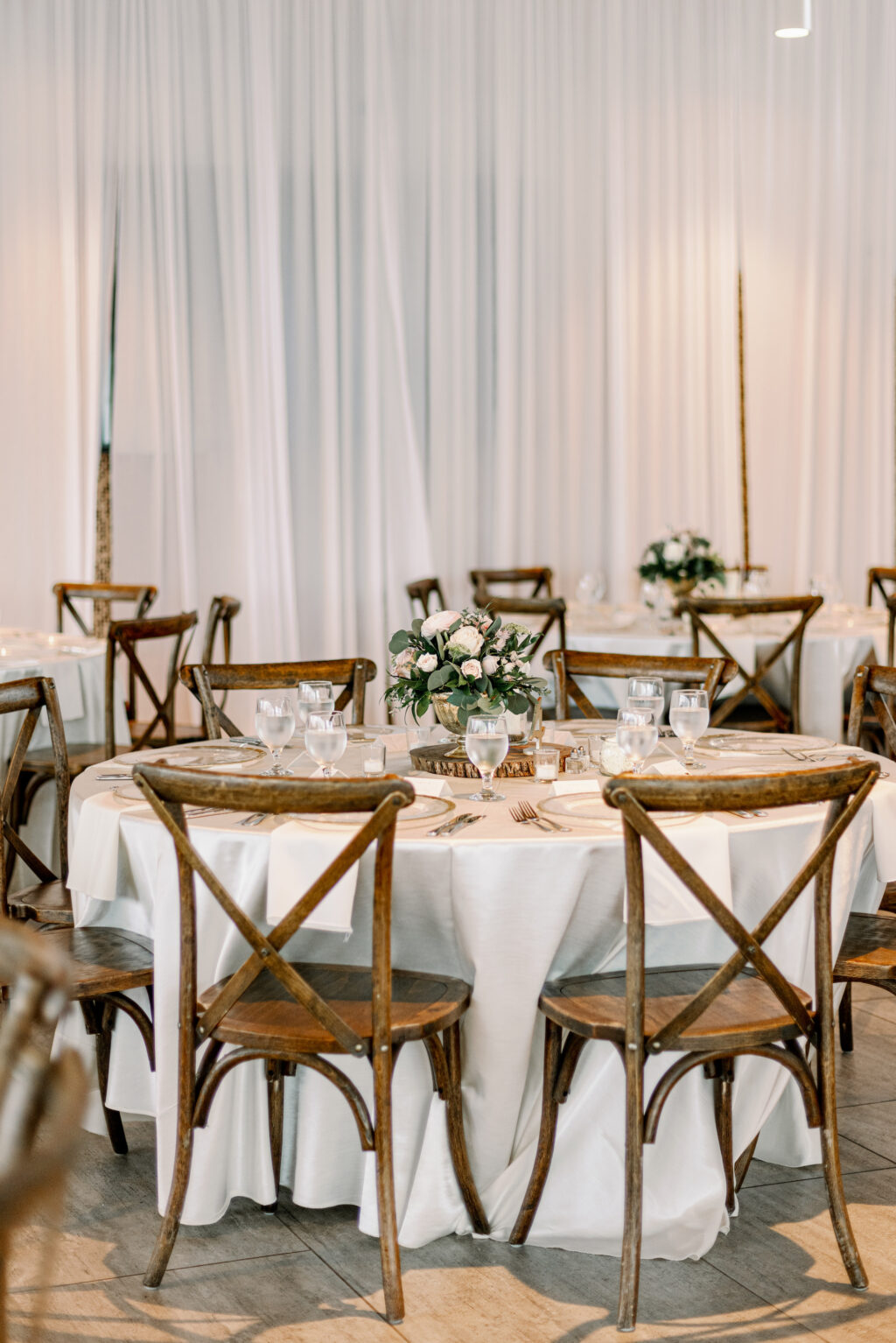 Elegant Rustic Wedding Reception Ideas | Wooden Cross-Back Chairs with White Linens | Tampa Bay Kate Ryan Event Rentals