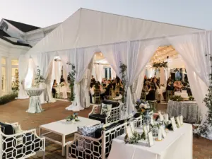 Outdoor Tented Wedding Reception with Drapery Curtains | Elegant White and Navy Lounge Chairs for Cocktail Hour | South Tampa Venue | Tampa Yacht and Country Club | Rentals Gabro Event Services | Planner EventFull Weddings | Florist Save the Date Florida