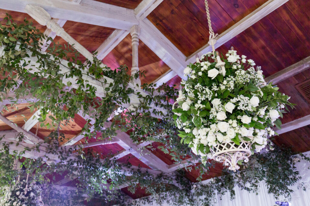 Hanging Floral Chandelier with White Roses, Babies Breath, and Greenery | Elegant Wedding Reception Inspiration