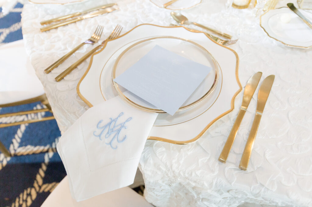 Classic Gold and White Chargers and Plates Reception Place Setting | Gold Flatware | Light Blue Monogrammed Napkin Ideas