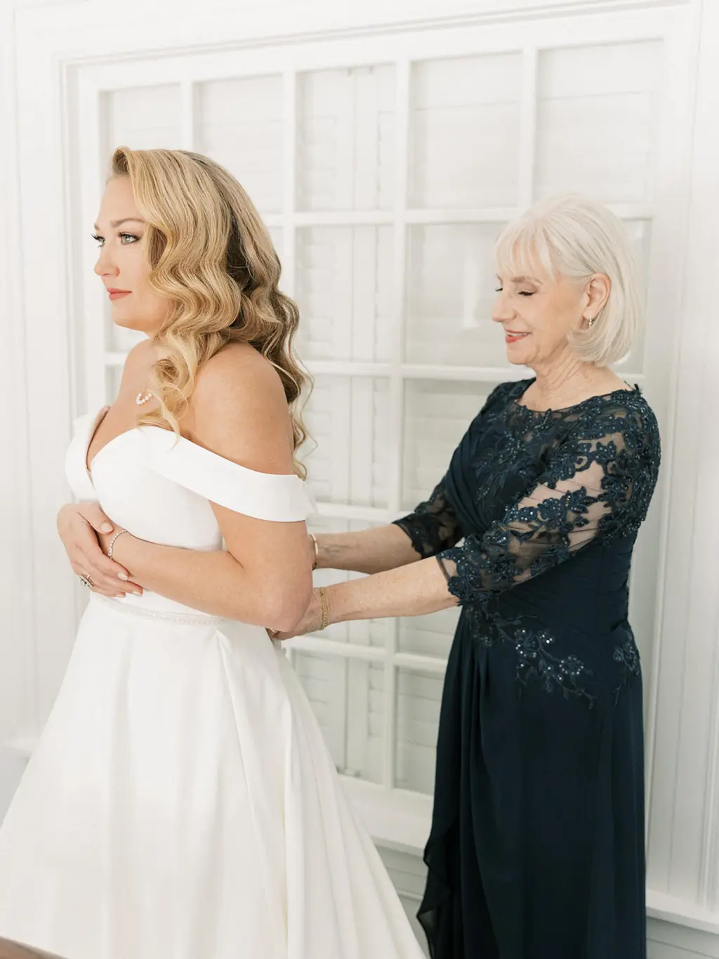 Bride Getting Ready | White Classic Off-the-shoulder A-line Wedding Dress | Wavy Wedding Hair Ideas | Tampa Bay Hair and Makeup Artist Femme Akoi Beauty Studio