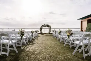 Round Wedding Ceremony Altar Arch Decor Ideas with Greenery, White Roses, and Hydrangeas | Waterfront Clearwater Venue Opal Sands