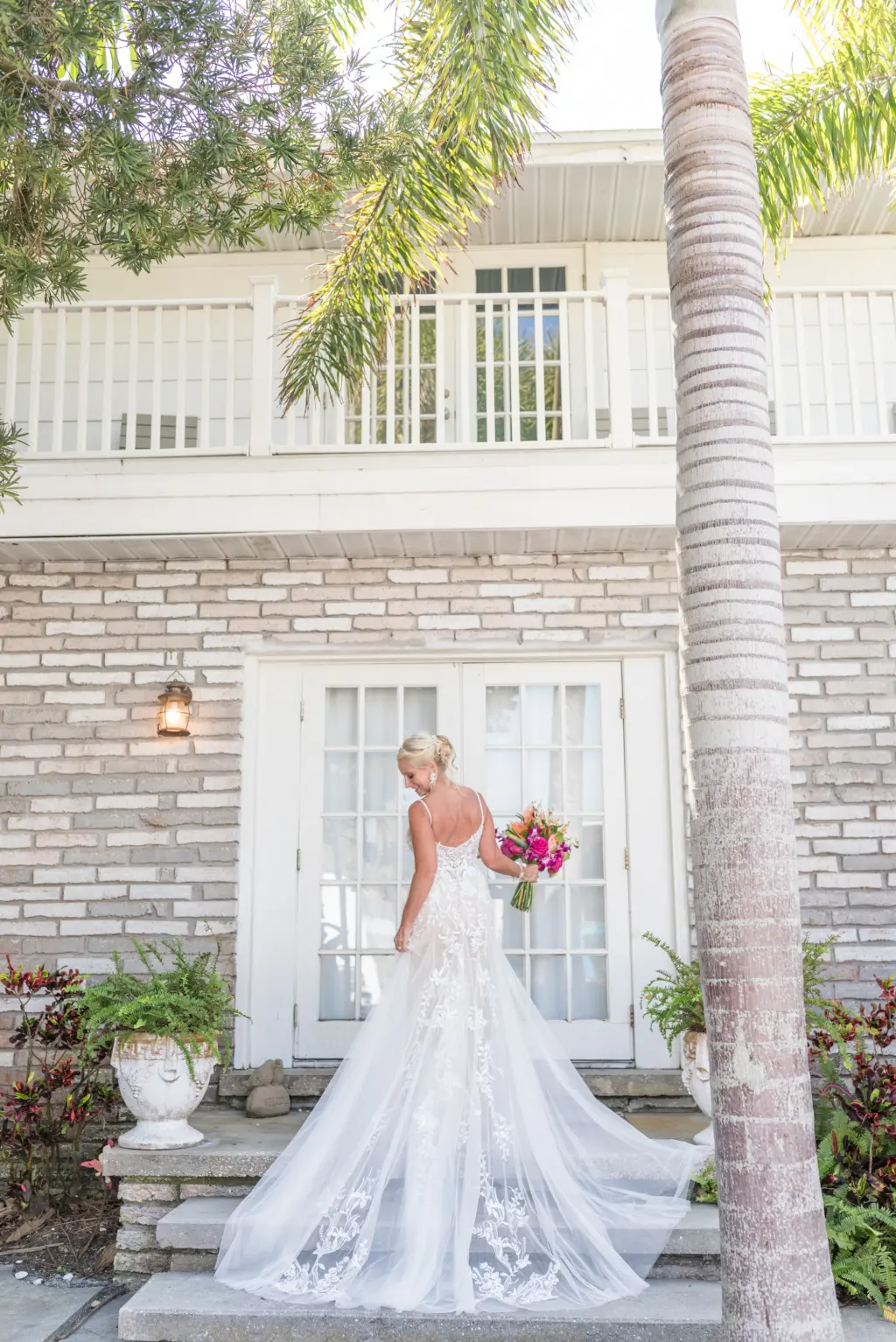 Lace Wedding Dress and Tropical Pink and Orange Wedding Bouquet Portrait Tampa Photographer Amber Zabrocki Photography