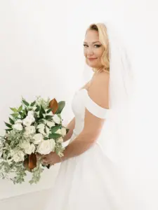 Bridal Glamour Wedding Portrait | White Roses and Greenery Bouquet Inspiration | Wavy Wedding Hair Ideas | Tampa Bay Hair and Makeup Artist Femme Akoi Beauty Studio | Florist Save The Date Florida