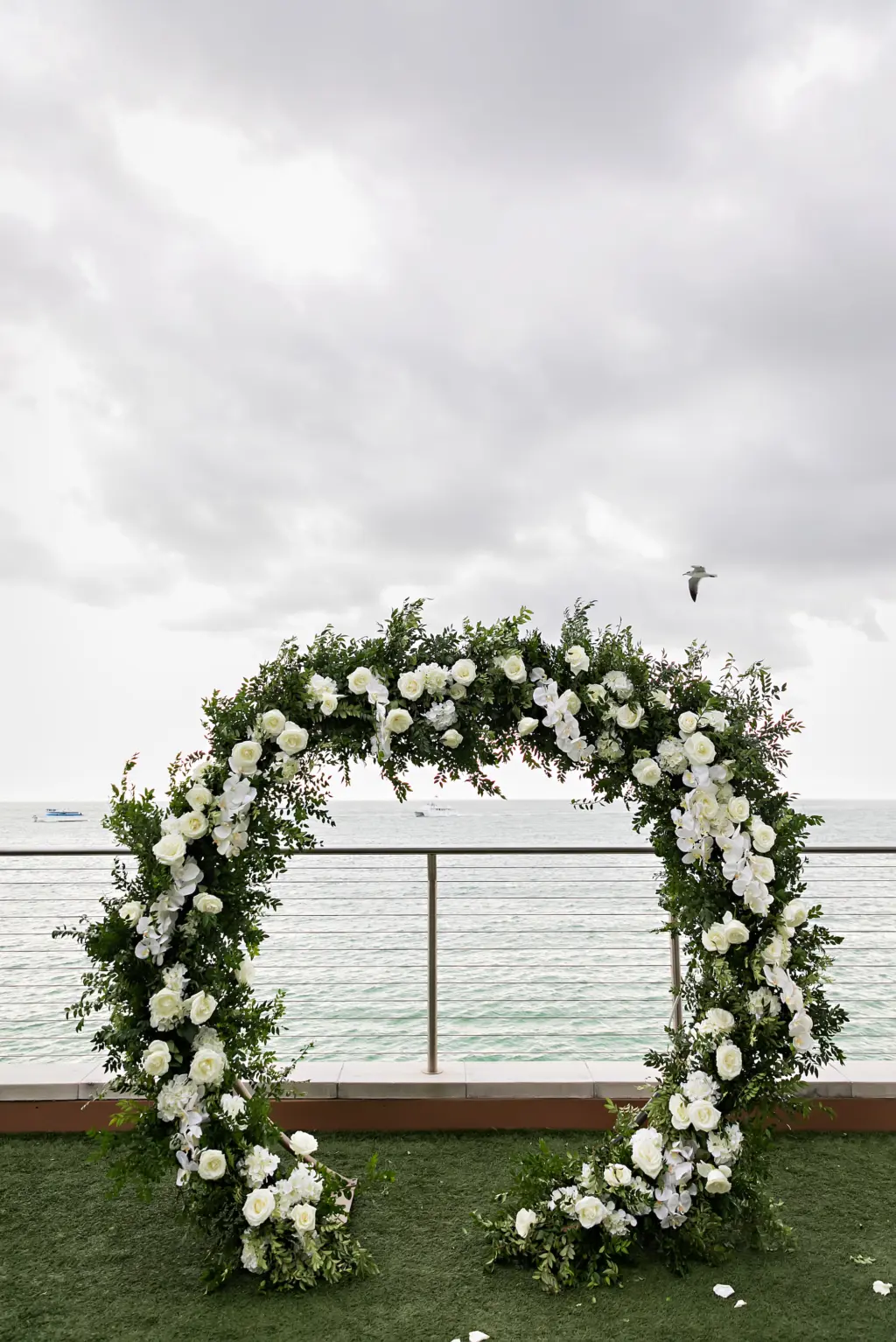 Round Wedding Ceremony Altar Arch Decor Ideas with Greenery, White Roses, and Hydrangeas