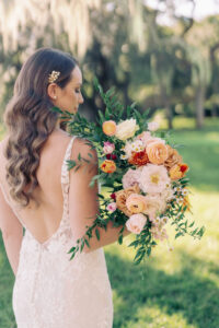 Orange, Blush, and White Fall Wedding Bouquet Inspiration | Long Wavy Bridal Hair Ideas with Beaded Hair Clip Ideas | Tampa Planner Kelly Kennedy Weddings and Events