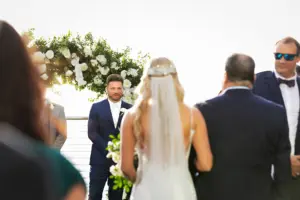 Groom's Reaction to Bride and Father Walking Down Wedding Aisle