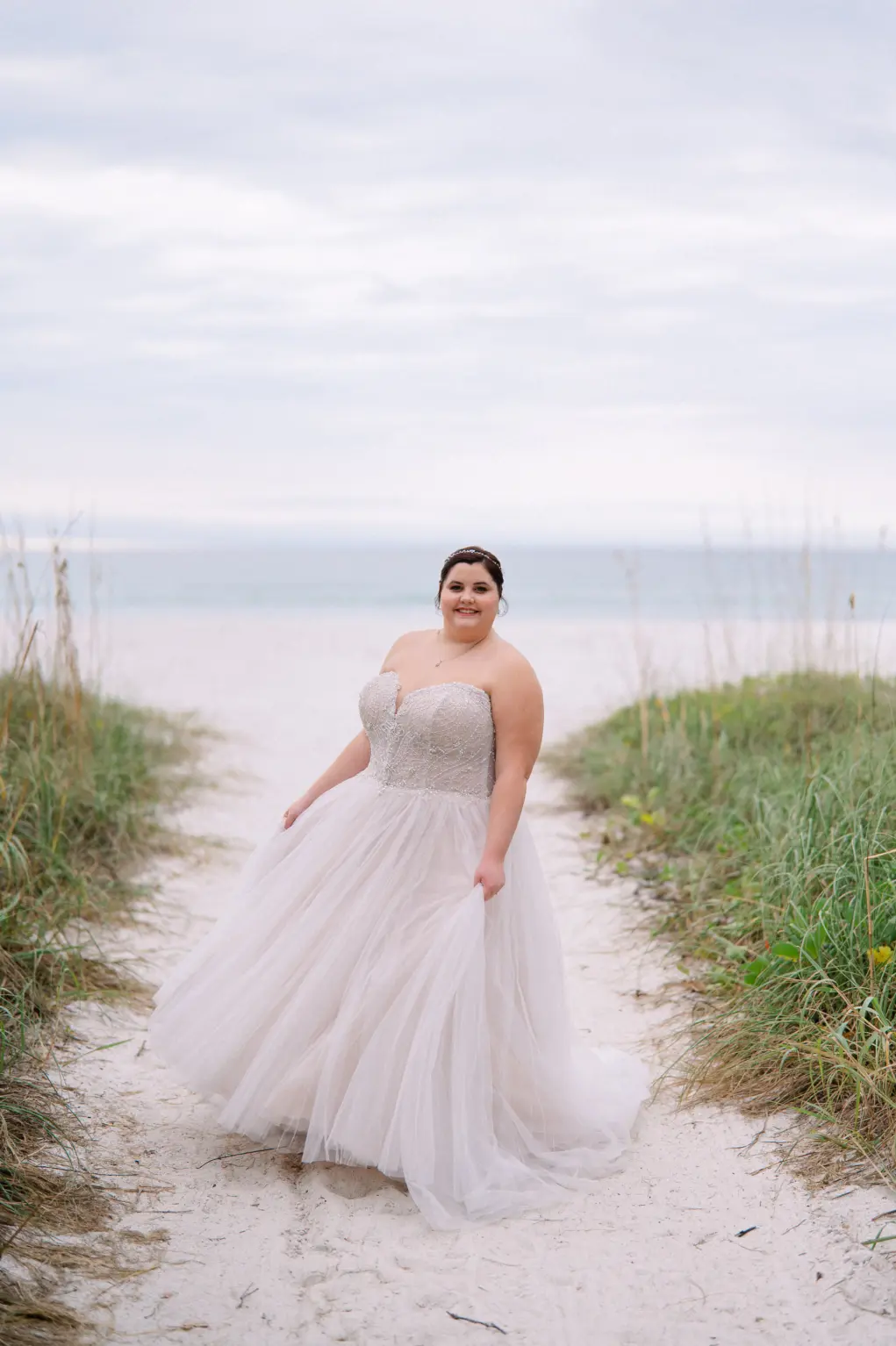 Bride Walking on Longboat Key Club Beach Wedding Portrait
