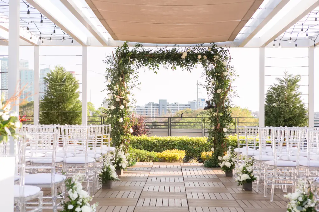 Rooftop Wedding Ceremony Square Arch with Greenery and White Flowers Inspiration | Tampa Bay Kate Ryan Event Rentals | Rooftop 220 by Armature Works