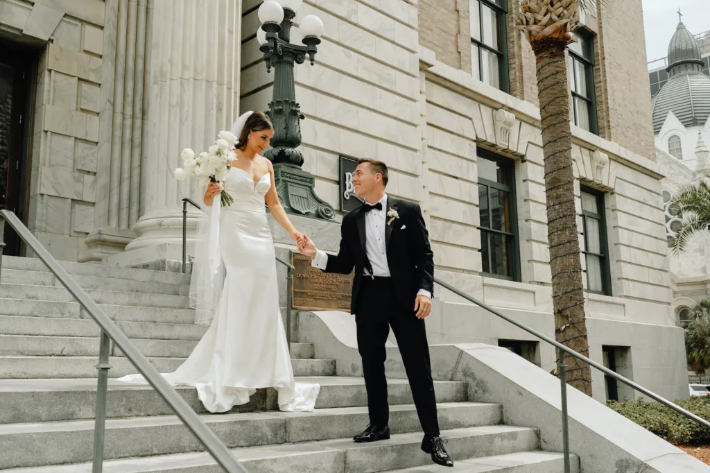 Bride and Groom on Historic Downtown Tampa Courthouse Wedding Portrait | Tampa Bay Wedding Photography and Videography J & S Media | Planner Coastal Coordinating | Venue Le Meridien