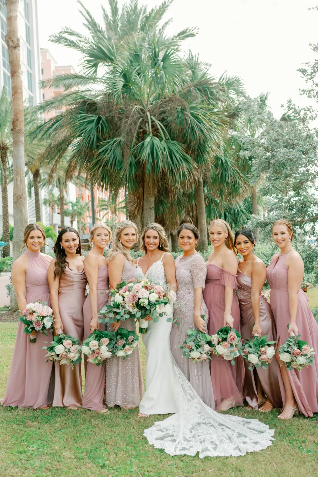 Bride with Bridesmaids in Pastel Pink Mauve Mix and Match Bridesmaids Dresses Wedding Portrait Ideas