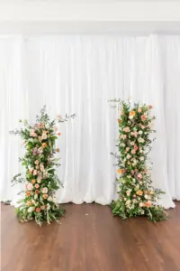 Half Floral Arch Wedding Ceremony Decor with Greenery and Peach and Blush Spring Wedding Ideas