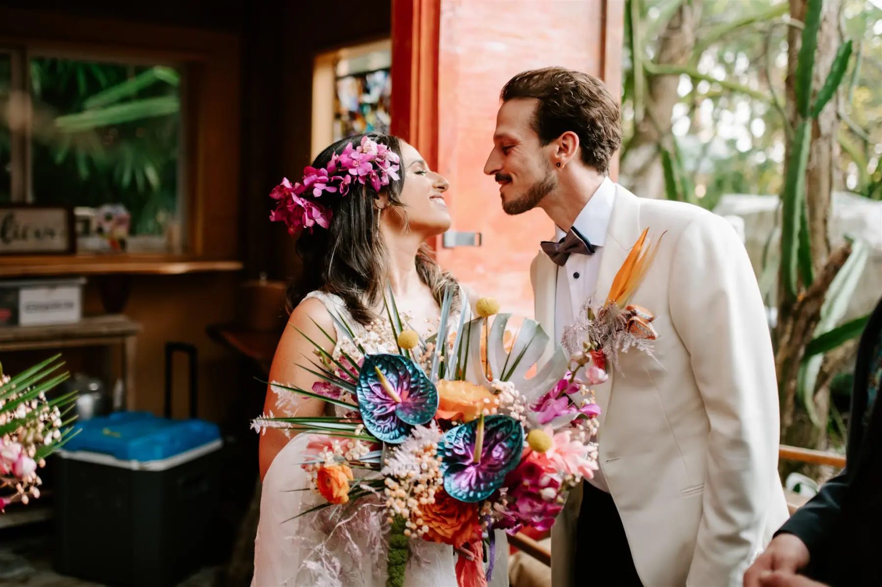 Bride and Groom Just Married Wedding Portrait | Tropical Bridal Bouquet Inspiration | Blue and Purple Anthurium, Monstera, Bird Of Paradise, Bougainvillea and Palm Lead Floral Arrangement Ideas | St. Pete Planner Wilder Mind Events