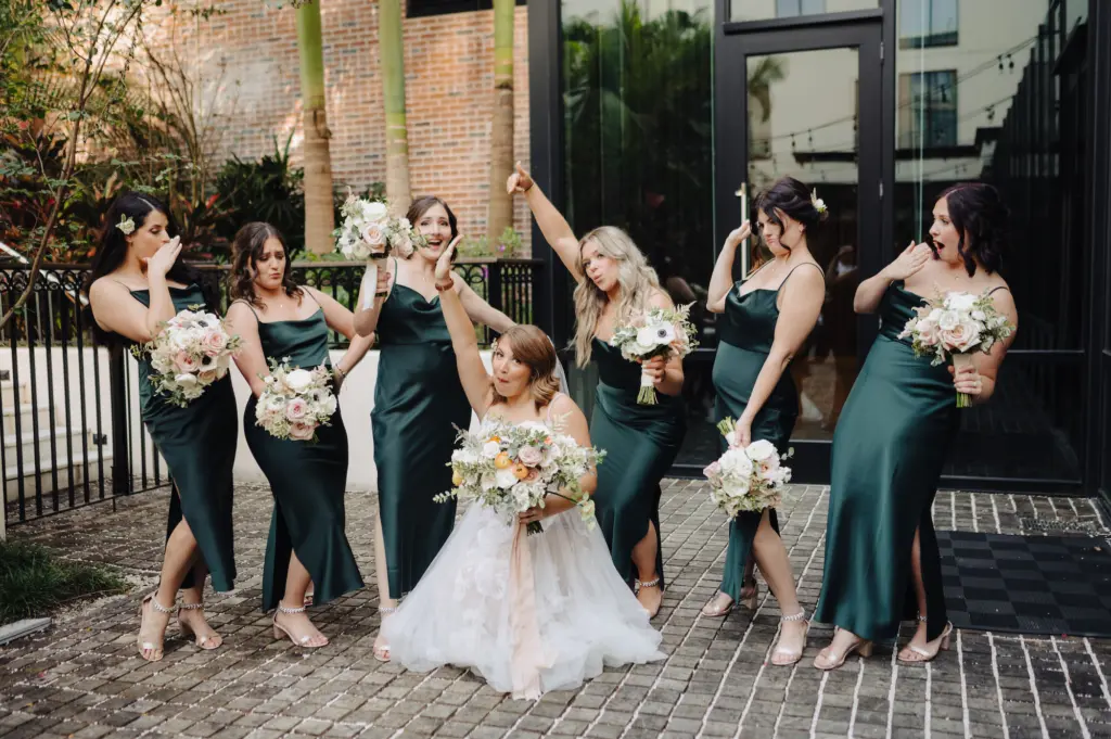 Emerald Green Satin Scowl Neck Bridesmaids Wedding Dress Ideas | Spring Wedding Bouquet with Pink, Orange, and White Roses and Greenery Inspiration