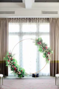 Wedding Ceremony Gold Circle Arch with Tropical Floral Details | St. Pete Venue The Birchwood