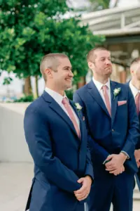 Groom Sees Bride Walk Down the Aisle for the First Time Wedding Portrait