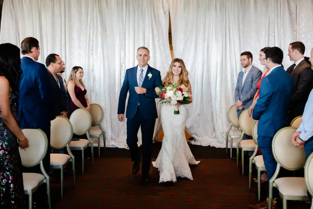Father of the Bride Walks Bride Down the Aisle in Indoor Birchwood Wedding