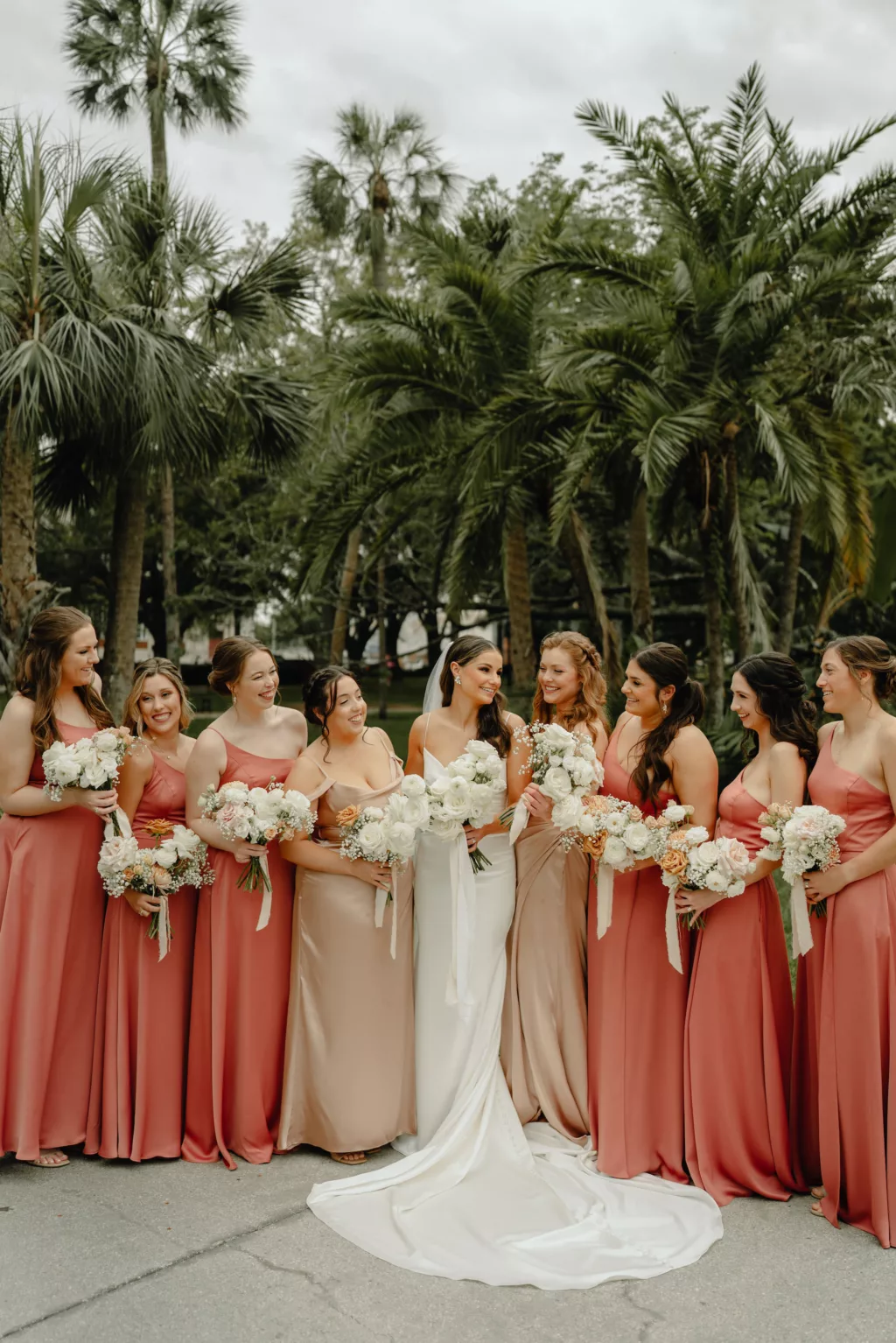 Matching Pink and Champagne Chiffon Bridesmaids Dress Ideas | Elegant White Roses, Baby's Breath, Ranunculus, Pink Roses, and Chrysanthemums Spring Wedding Bouquet Inspiration | Tampa HMUA Femme Akoi Beauty Studio