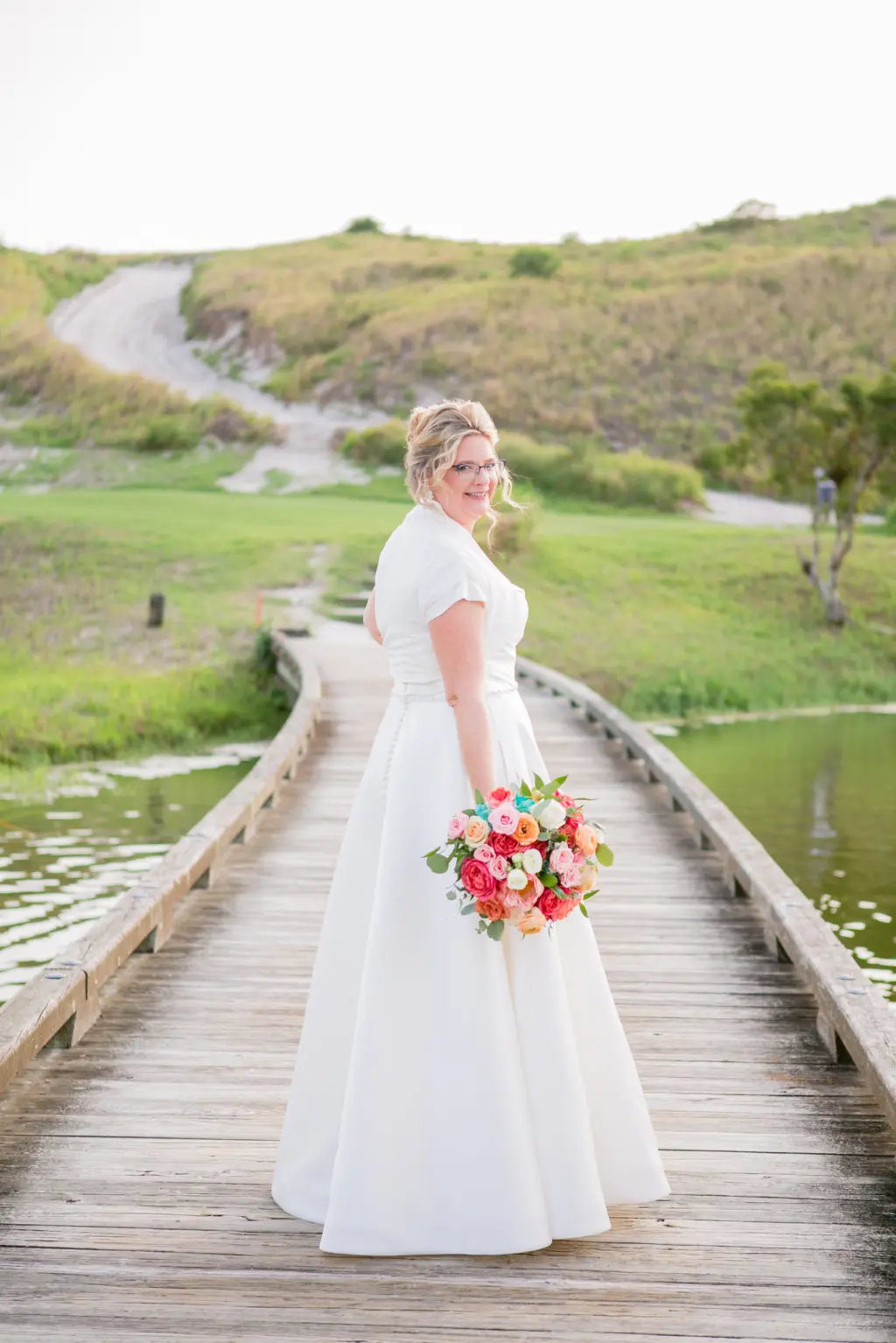 Bride in Cap Sleeve Full Skirt Taffeta Ballgown | Tampa Wedding Dress Truly Forever Bridal Tampa | Colorful Turquoise, Pink, and Coral Summer Wedding Floral Inspiration | Tampa Florist Monarch Events and Designs