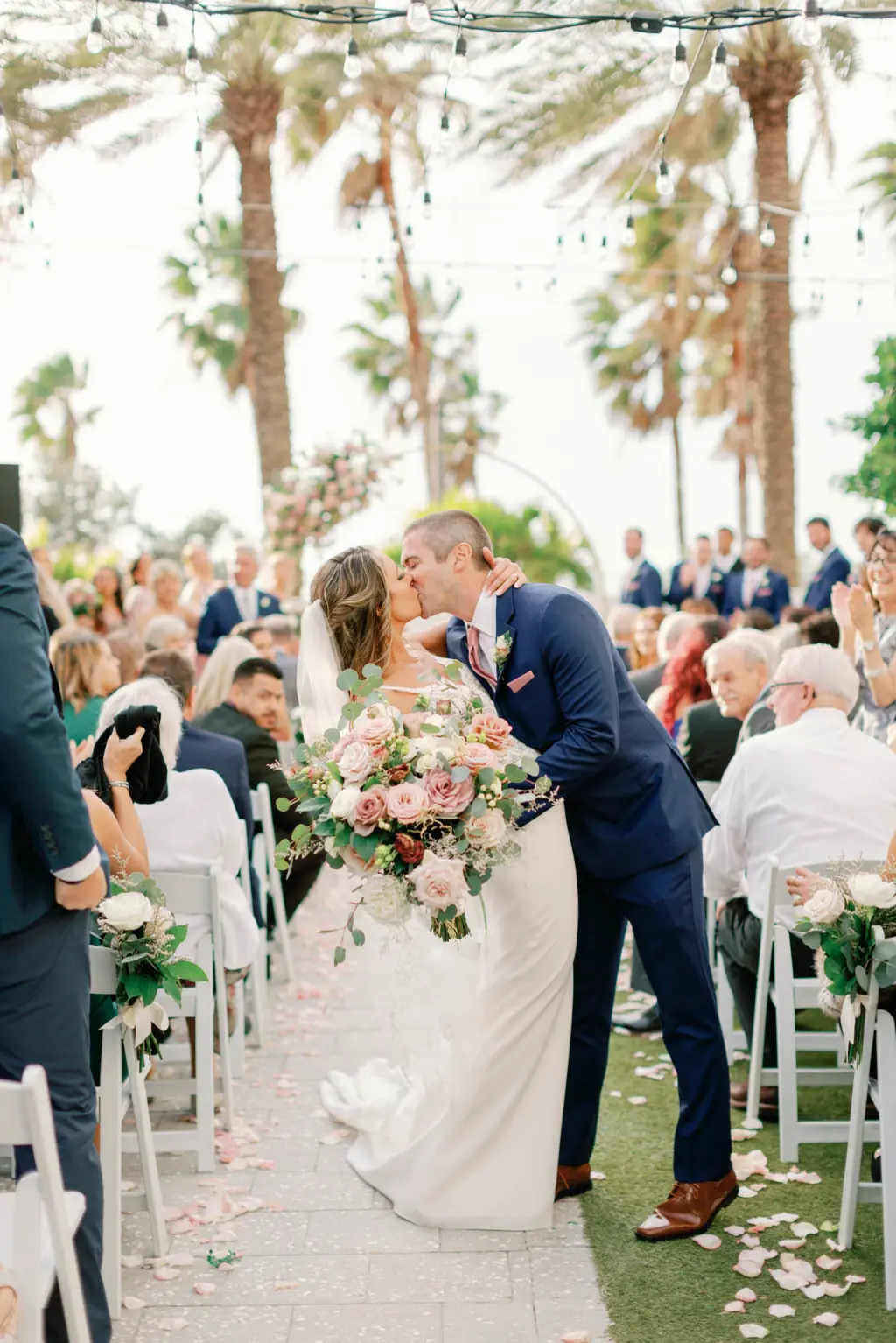 Bride and Groom Just Married Kissing Wedding Portrait | Venue Wyndham Grand Clearwater Beach