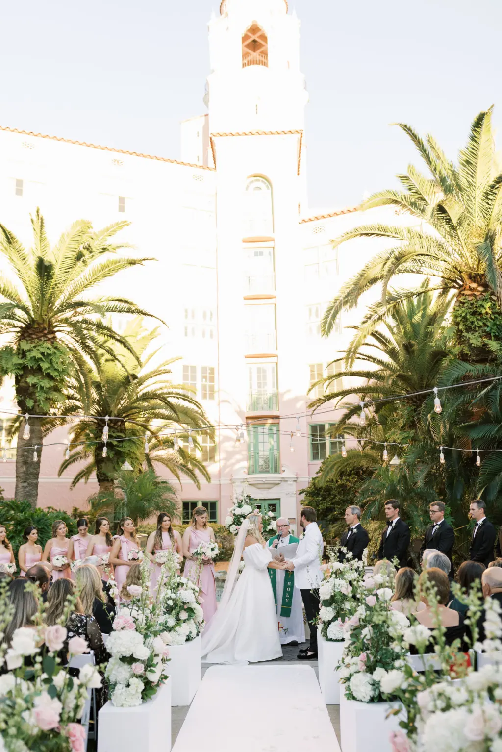 Bride and Groom Vow Exchange | Outdoor Pink Religious Wedding Ceremony Inspiration | Tampa Bay Florist Bruce Wayne Florals | St Petersburg Planner Parties A La Carte